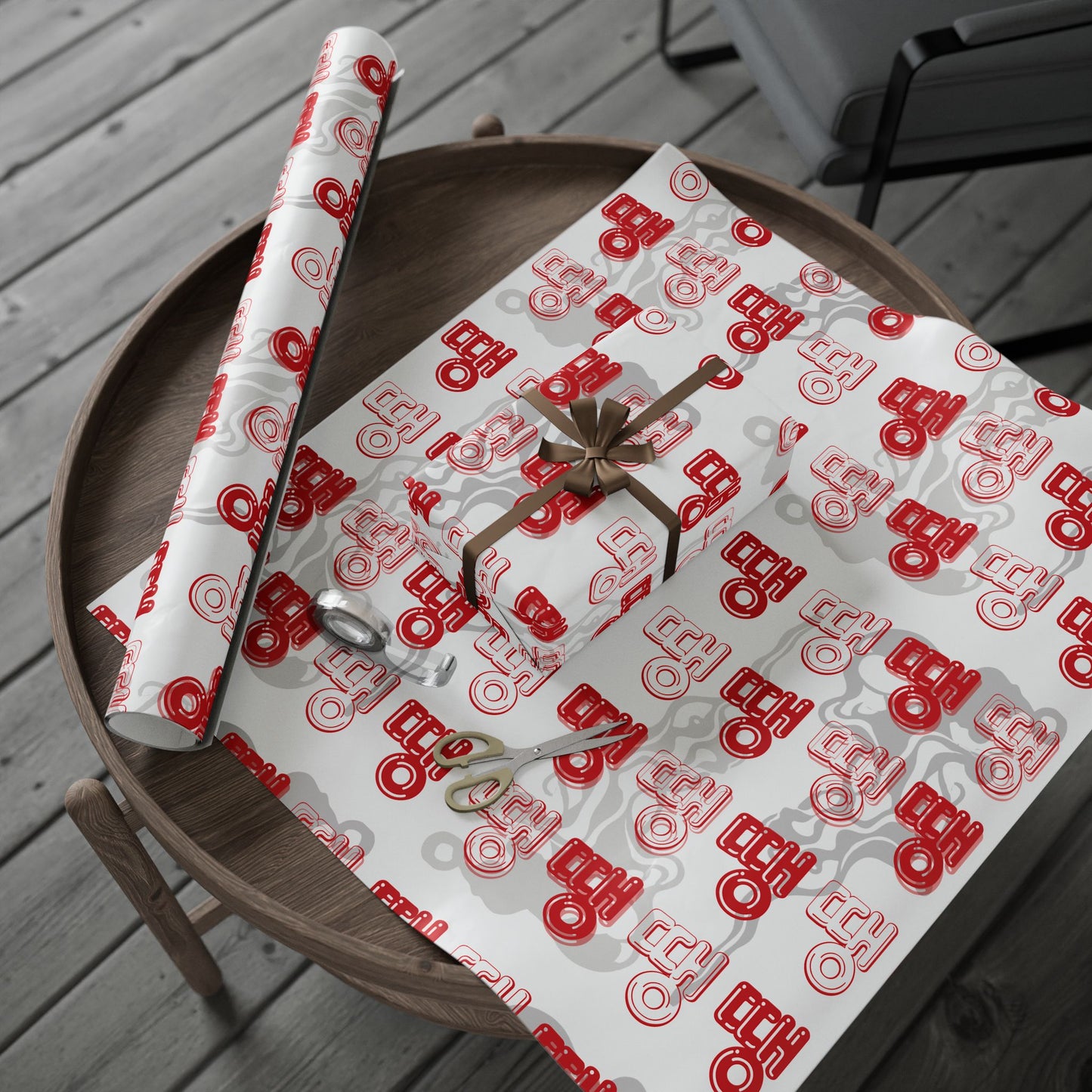 Rolls of red and white patterned gift wrap on a wooden table. - BTS Rapline "Ddaeng" Inspired Gift Wrapping Paper