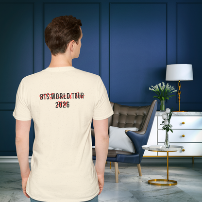 Person wearing a beige t-shirt with 'BTS World Tour 2026' text in a modern living room. - Bangtan 2026 Unofficial Shirt [Bias Arirang Color Vinyl Edition], OT7, cream, J-Hope Hobi Hoseok