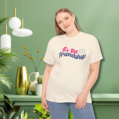 It's the friendship with polaroid image - short sleeve shirt, cream color, Jimin, Jungkook, Jikook, Minimoni, RM; woman wearing the shirt in a green room with a green table with flora arrangements on it and a chandelier orbs lamp hanging to the left side by a floor plant