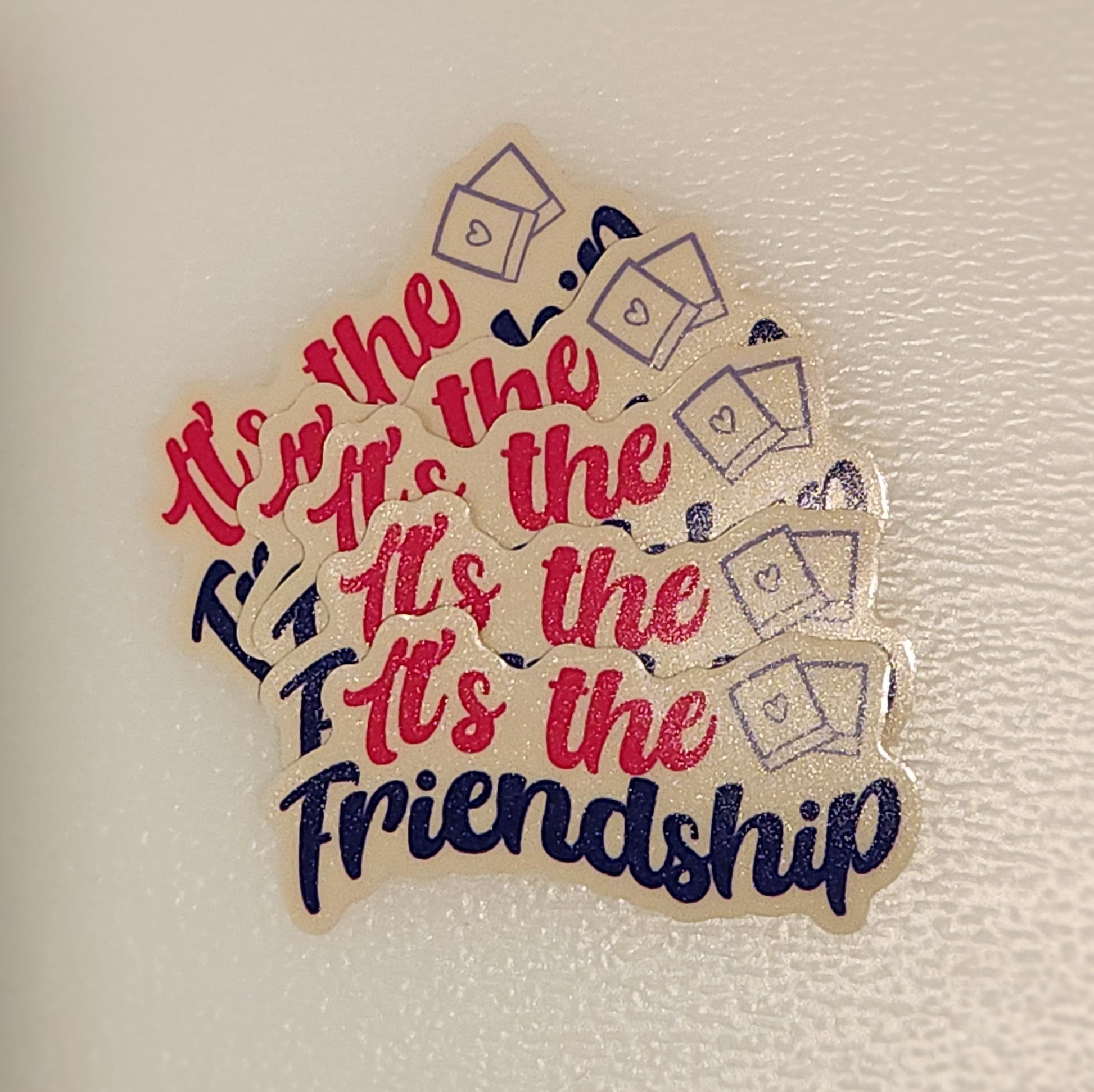 Sticker with 'It's the friendship' text on a textured beige background - minimoni, jikook