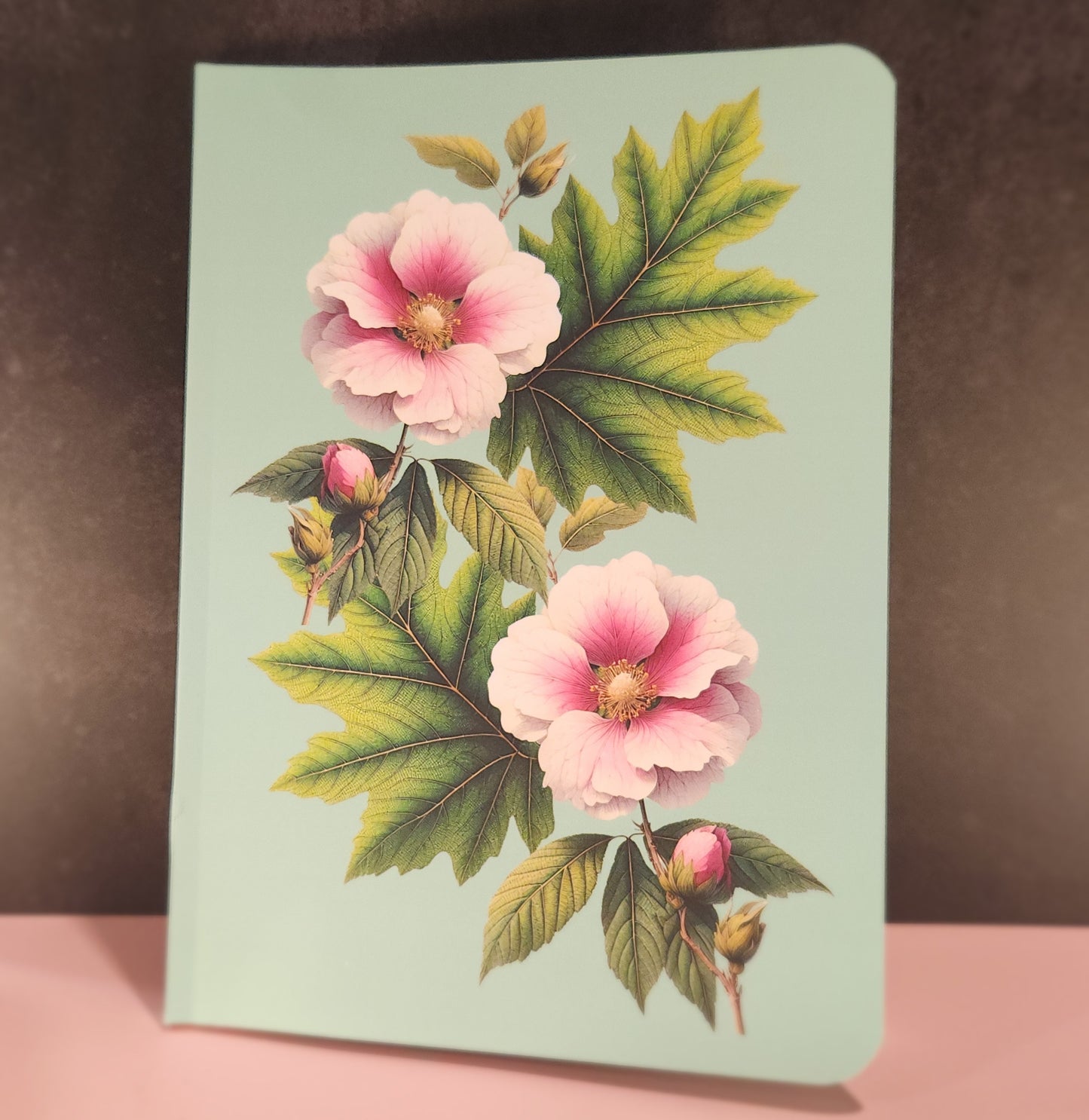 Notebook with floral design on a light green background - mugunghwa and oak leaf botanical design - teal / sage green cover, perforated notebook