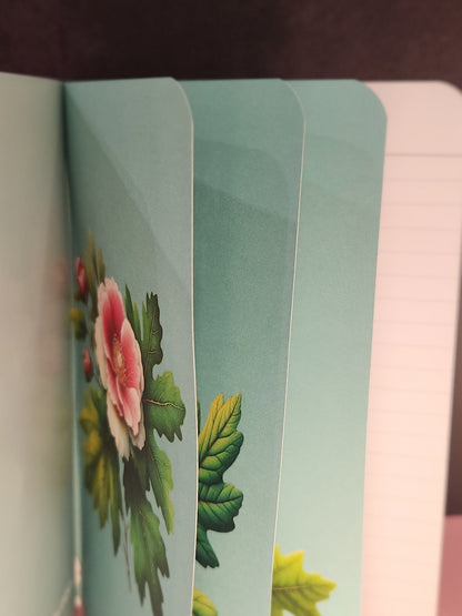 Floral design on a green card with a blurred background - mugunghwa and oak leaf botanical design - teal / sage green cover, perforated notebook