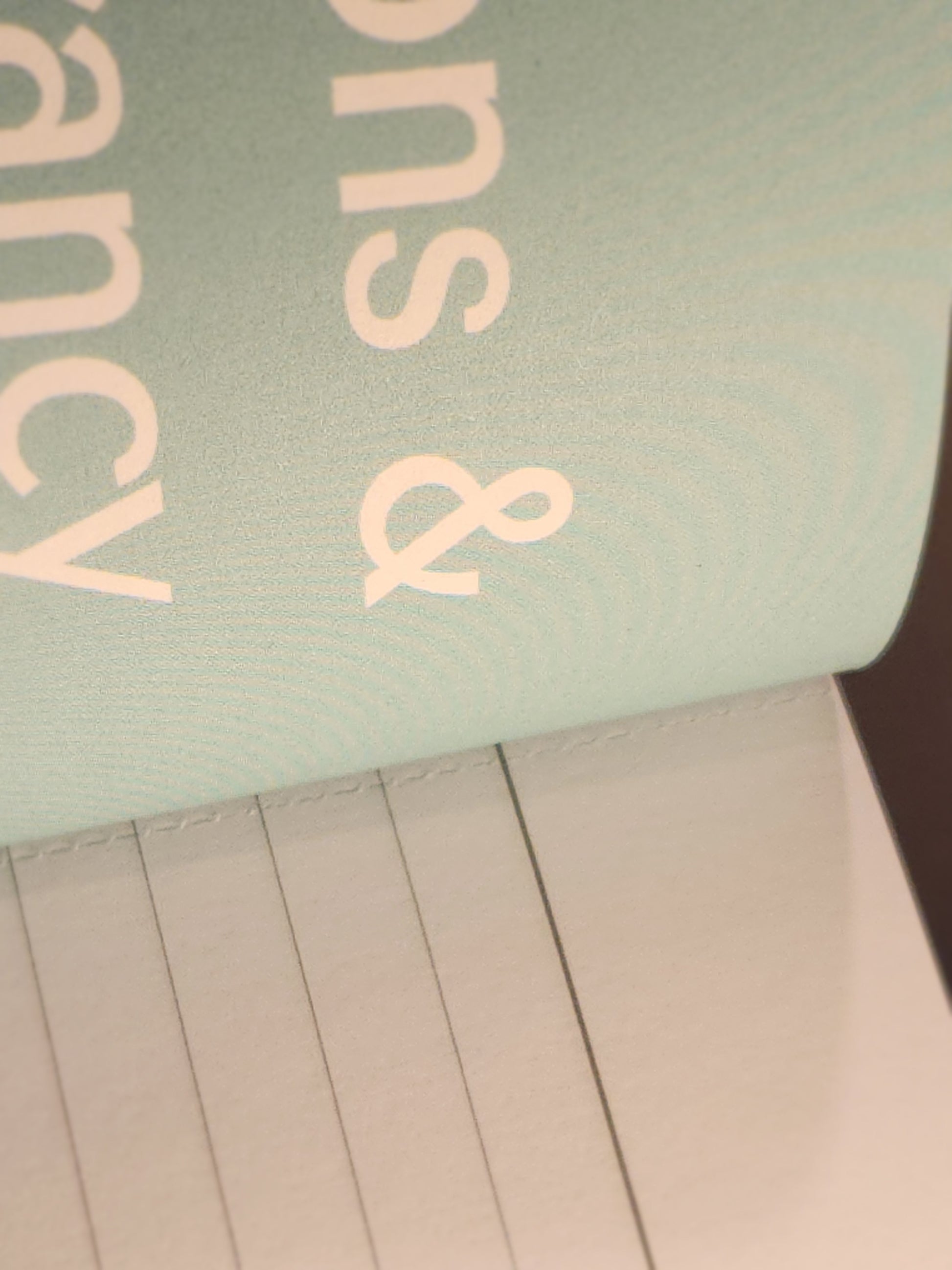 Notebook with lined pages and a green cover with text. - mugunghwa and oak leaf botanical design - teal / sage green cover, perforated notebook