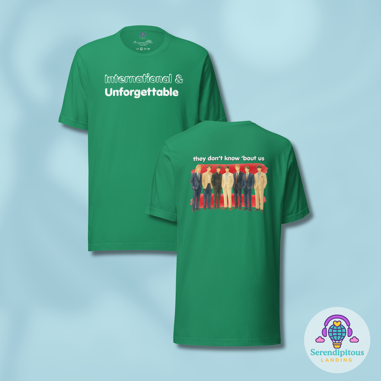 Green t-shirt with text and graphic design on a light blue background - Laureles Internacionales Unisex T-Shirt | Serendipitous Landing