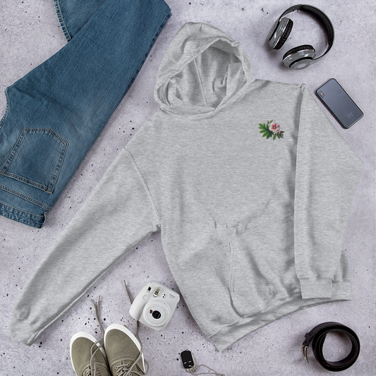 Gray hoodie with floral design on a gray surface with jeans, shoes, and accessories.  - mugunghwa and oak leaf botanical design - light grey gray hooded sweatshirt, hoodie