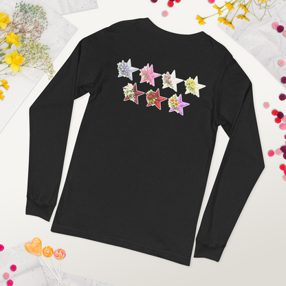 Black long-sleeve shirt with colorful star-shaped designs on a white background with flowers and confetti. - The Insignia Bloom Long Sleeve Shirt (Unisex) - 7 Stars collection design - BTS / Bangtan members birth flowers and Arirang vinyl colors